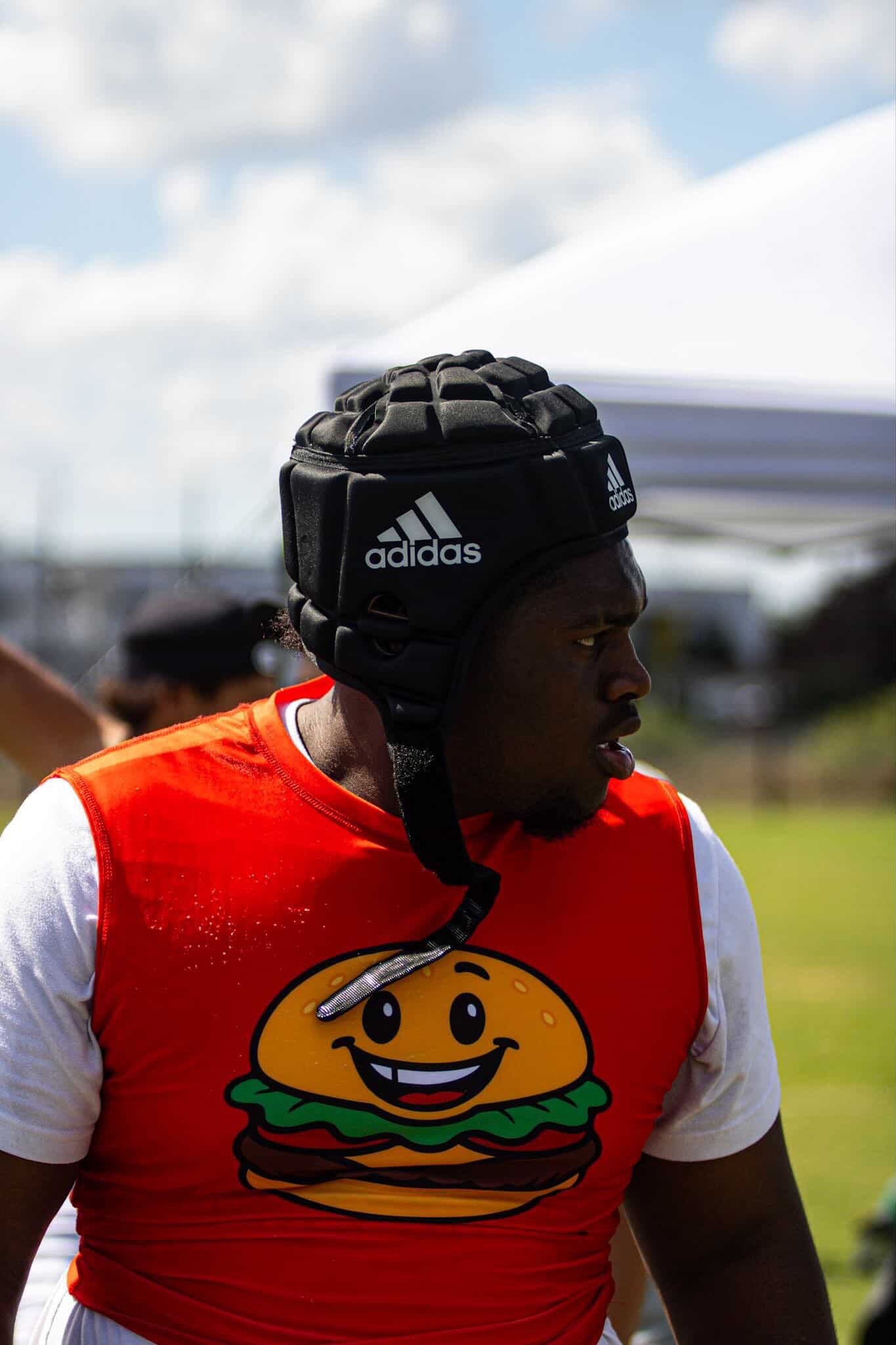 Jayden Hicks in his Burger Boyz uniform on the football field
