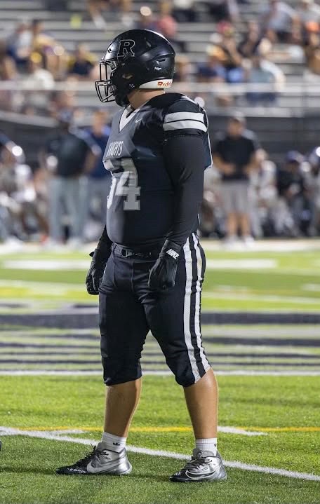 Xavier Bridges wearing number 74 on the football field